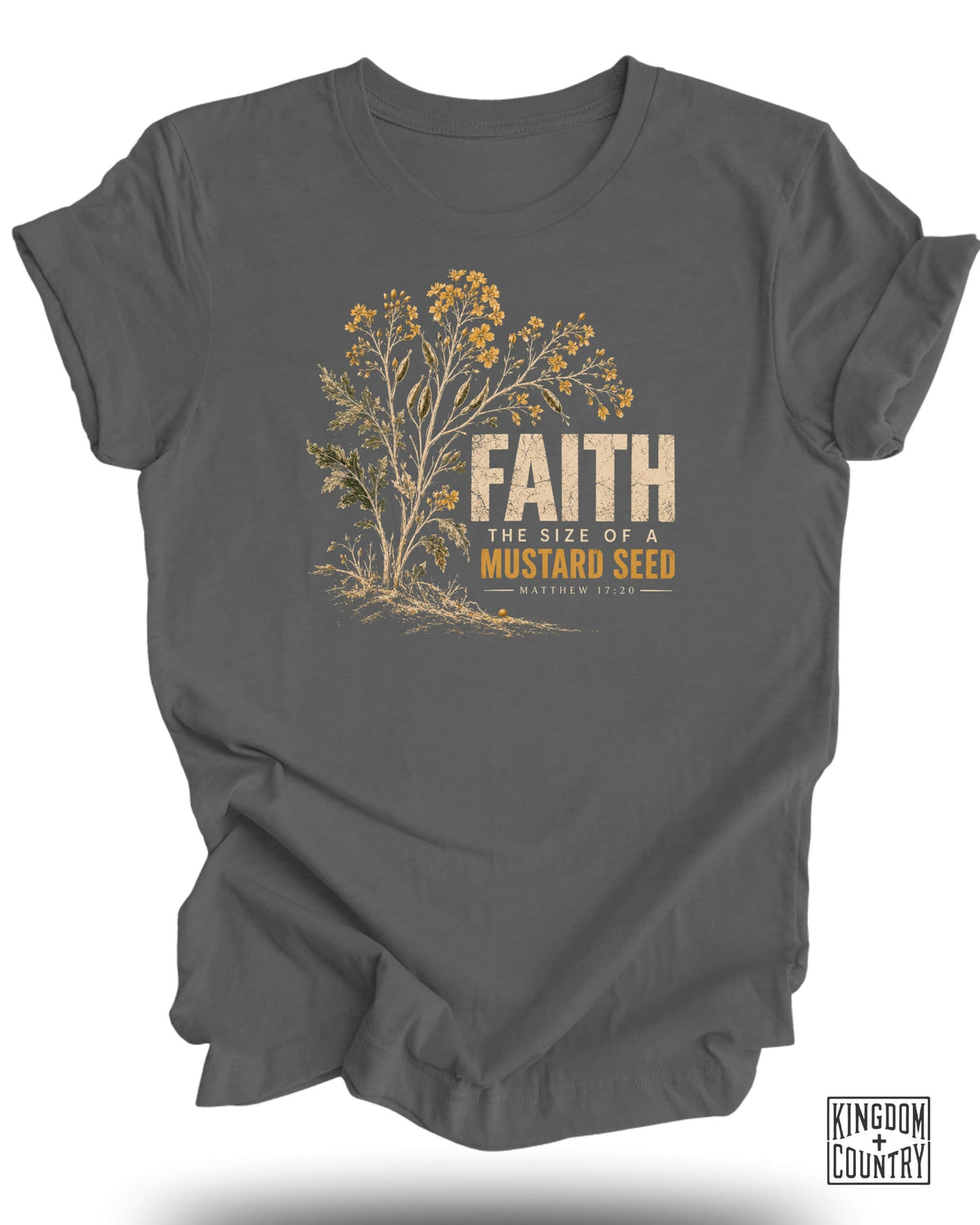 Gray t-shirt with mustard plant graphic and text "FAITH THE SIZE OF A MUSTARD SEED MATTHEW 17:20".