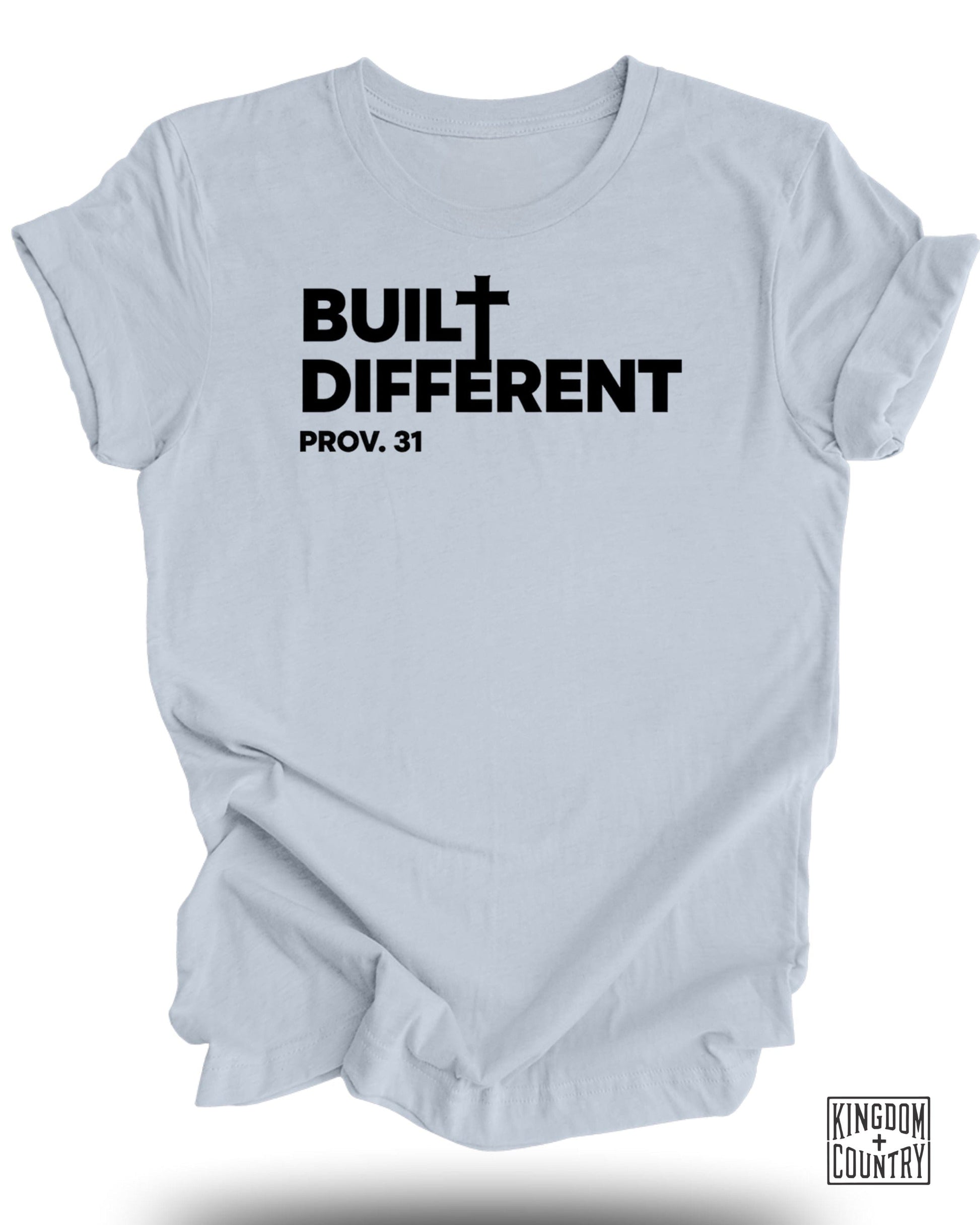 Light blue t-shirt with "BUILT DIFFERENT PROV. 31" and a cross logo.