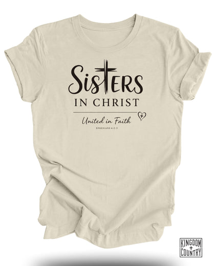 Cream t-shirt with "Sisters in Christ United in Faith" text and bible verse.