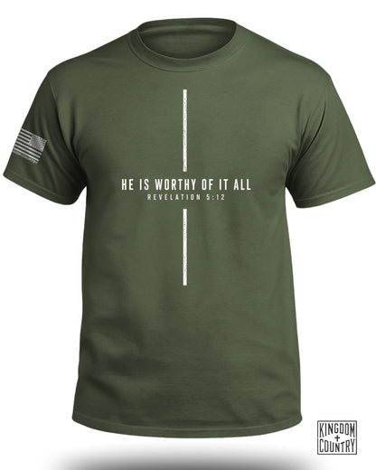 Olive green t-shirt with white text "HE IS WORTHY OF IT ALL REVELATION 5:12".