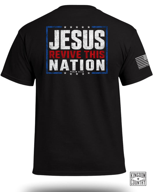 Black t-shirt with "Jesus Revive This Nation" text and small flag graphic.