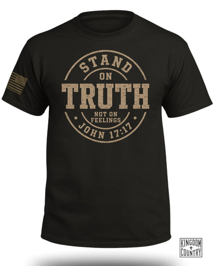 Black t-shirt with "Stand on Truth Not on Feelings John 17:17" graphic and flag patch.