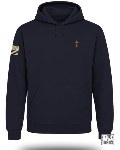 Navy blue hoodie with a wooden cross and "Daniel 3:25" on the chest.