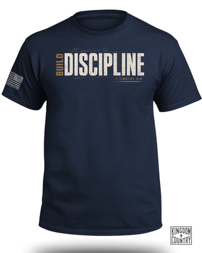Navy t-shirt with "BUILD DISCIPLINE" and "1 TIMOTHY 4:8" text.