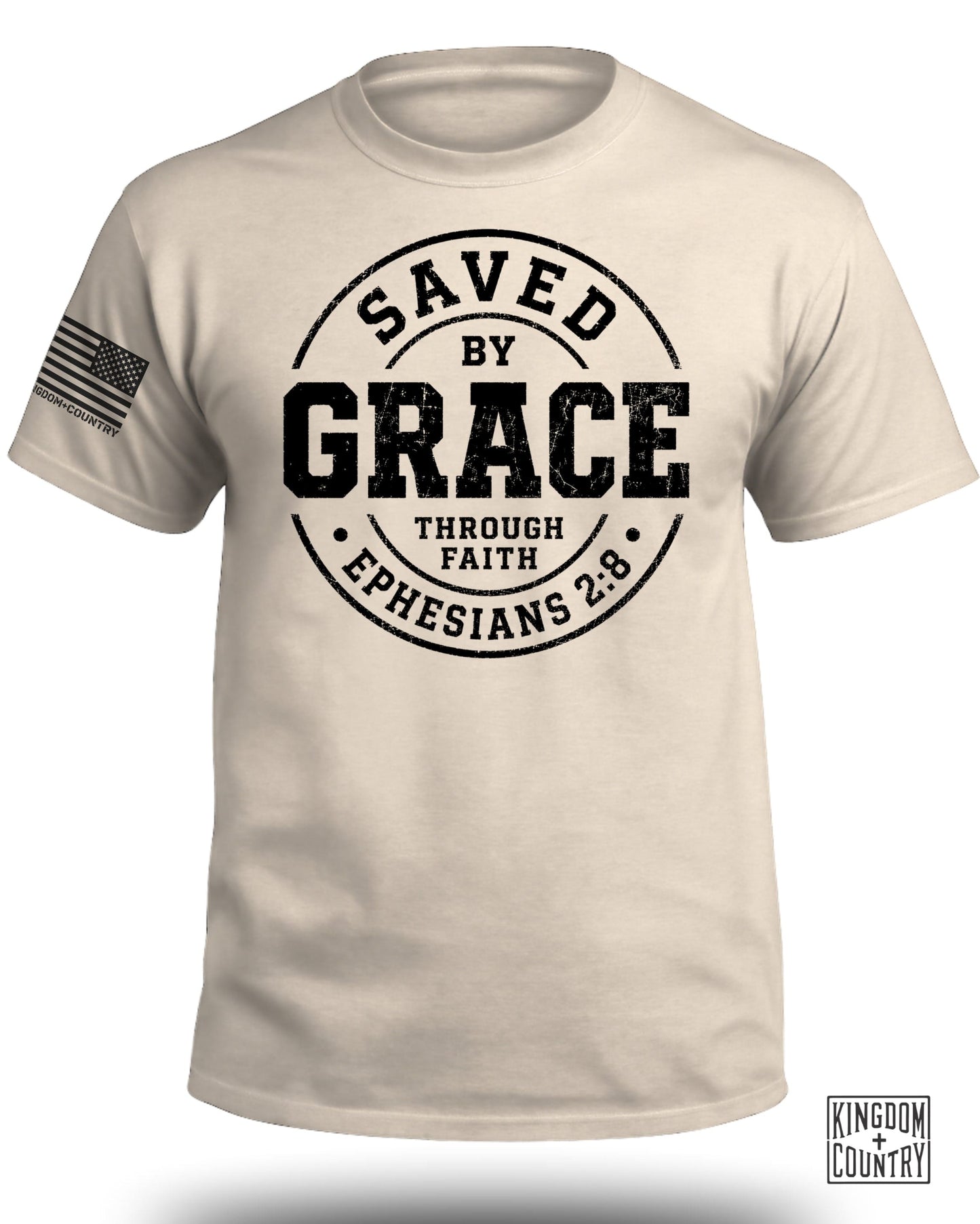 Cream t-shirt with "Saved by Grace Through Faith Ephesians 2:8" text and American flag logo.