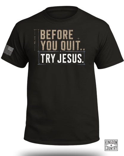 Black t-shirt with "BEFORE YOU QUIT.. TRY JESUS." text and American flag sleeve detail.