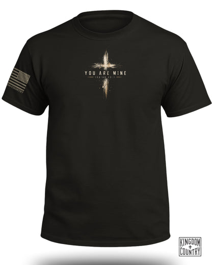 Black t-shirt with a distressed cross and "YOU ARE MINE ISAIAH 43:1" text.