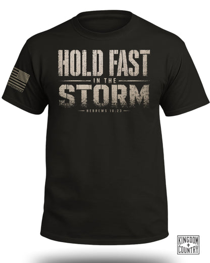 Black t-shirt with "Hold Fast In The Storm" and "Hebrews 10:23" text.