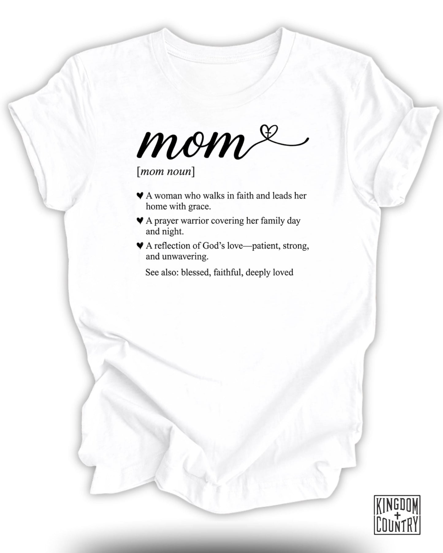 White t-shirt with "mom" definition text and Kingdom Country logo.