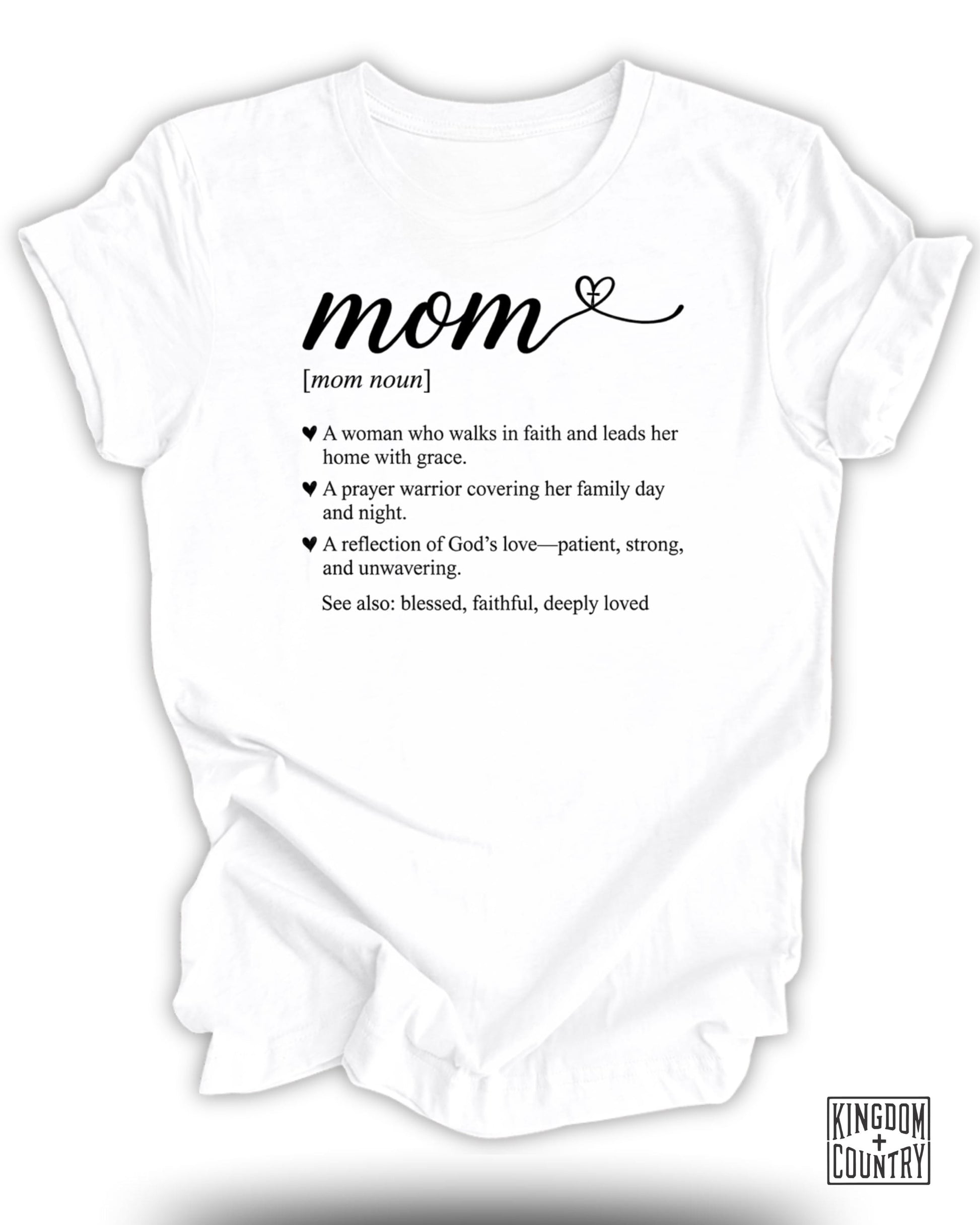 White t-shirt with "mom" definition text and Kingdom Country logo.