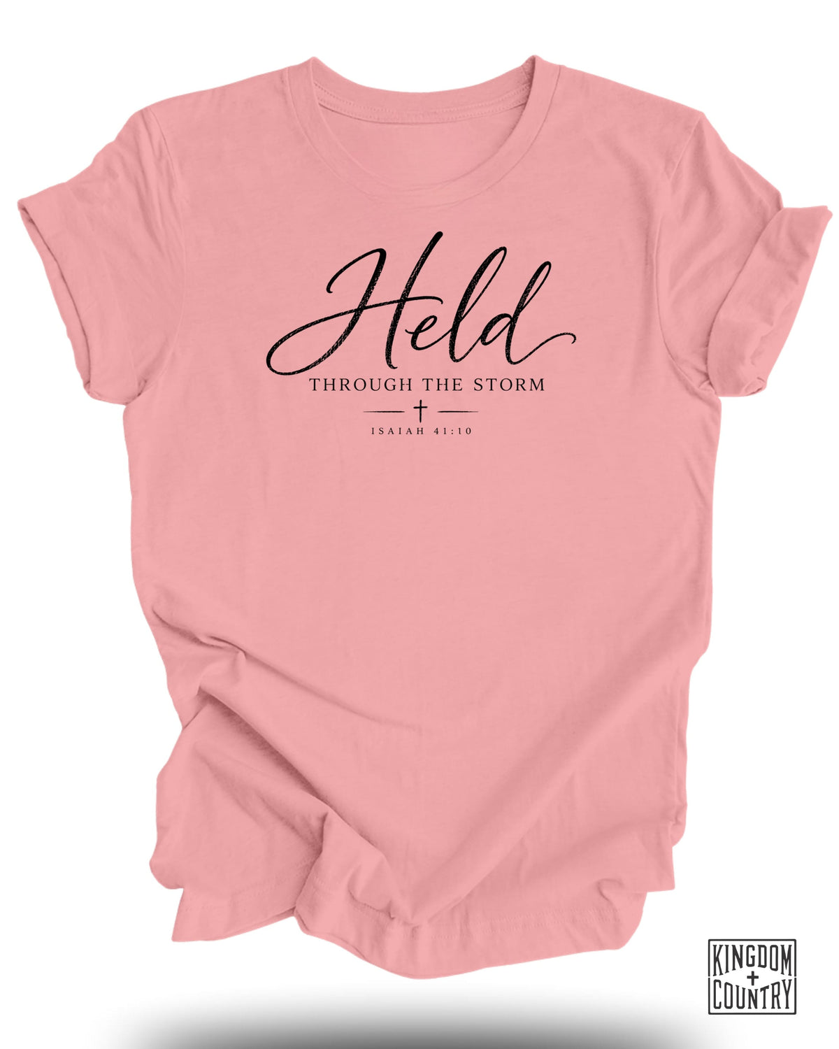 Pink t-shirt with "Held Through The Storm Isaiah 41:10" text.