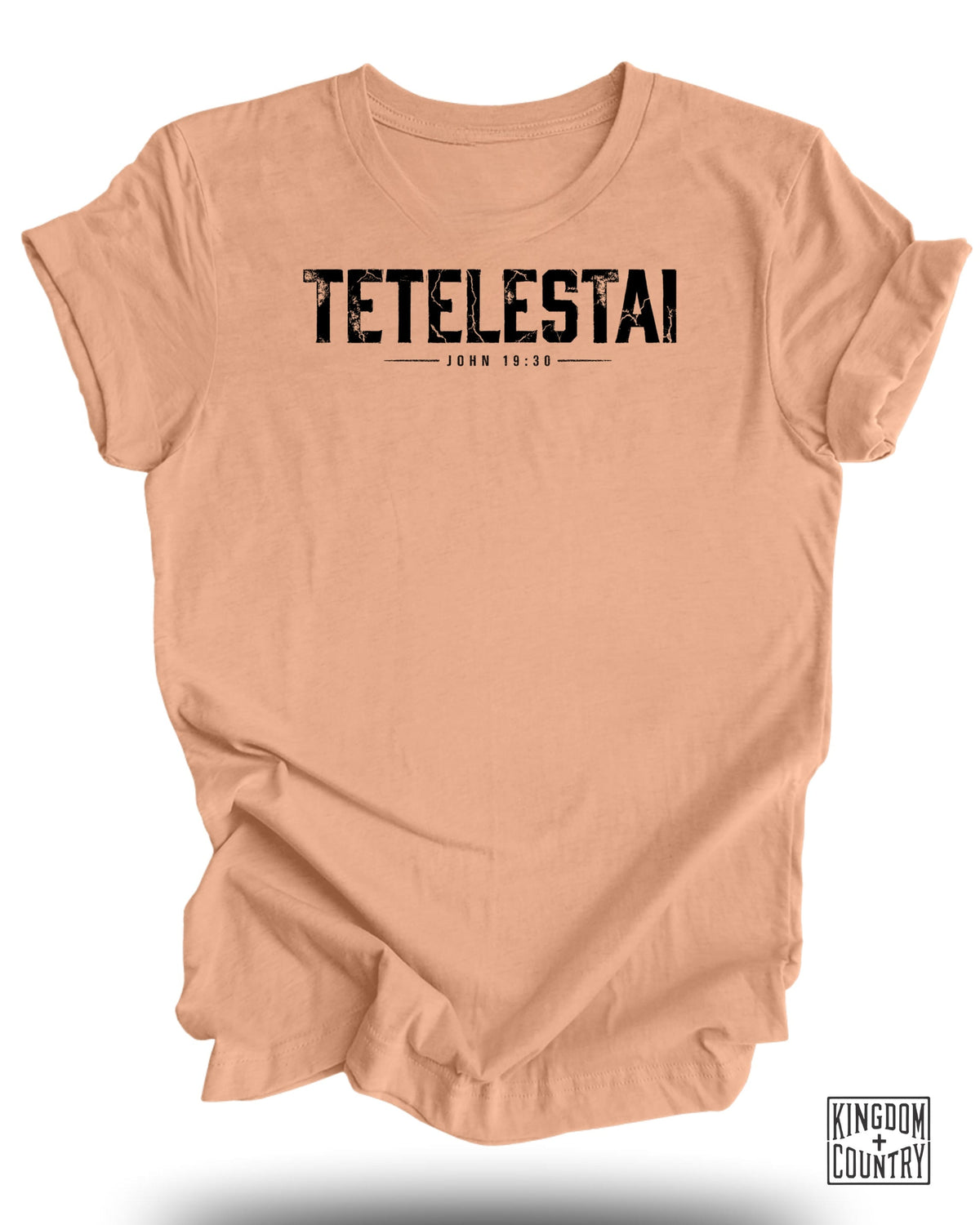 Peach t-shirt with black "TETELSTAI JOHN 19:30" text and Kingdom Country logo.