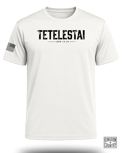 White t-shirt with "TETELESTAI" and "JOHN 19:30" text, American flag sleeve patch.