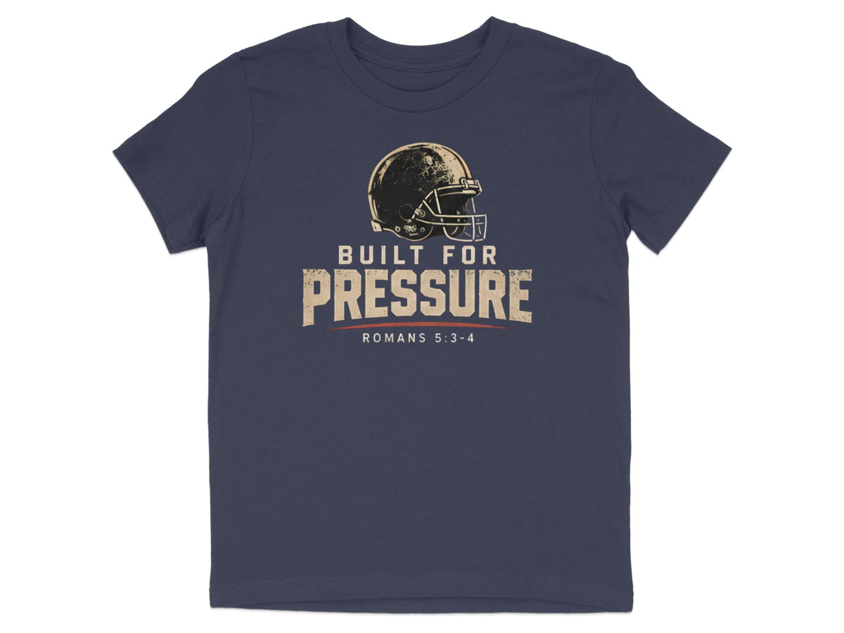 Navy t-shirt with a distressed football helmet and "Built For Pressure Romans 5:3-4" text.