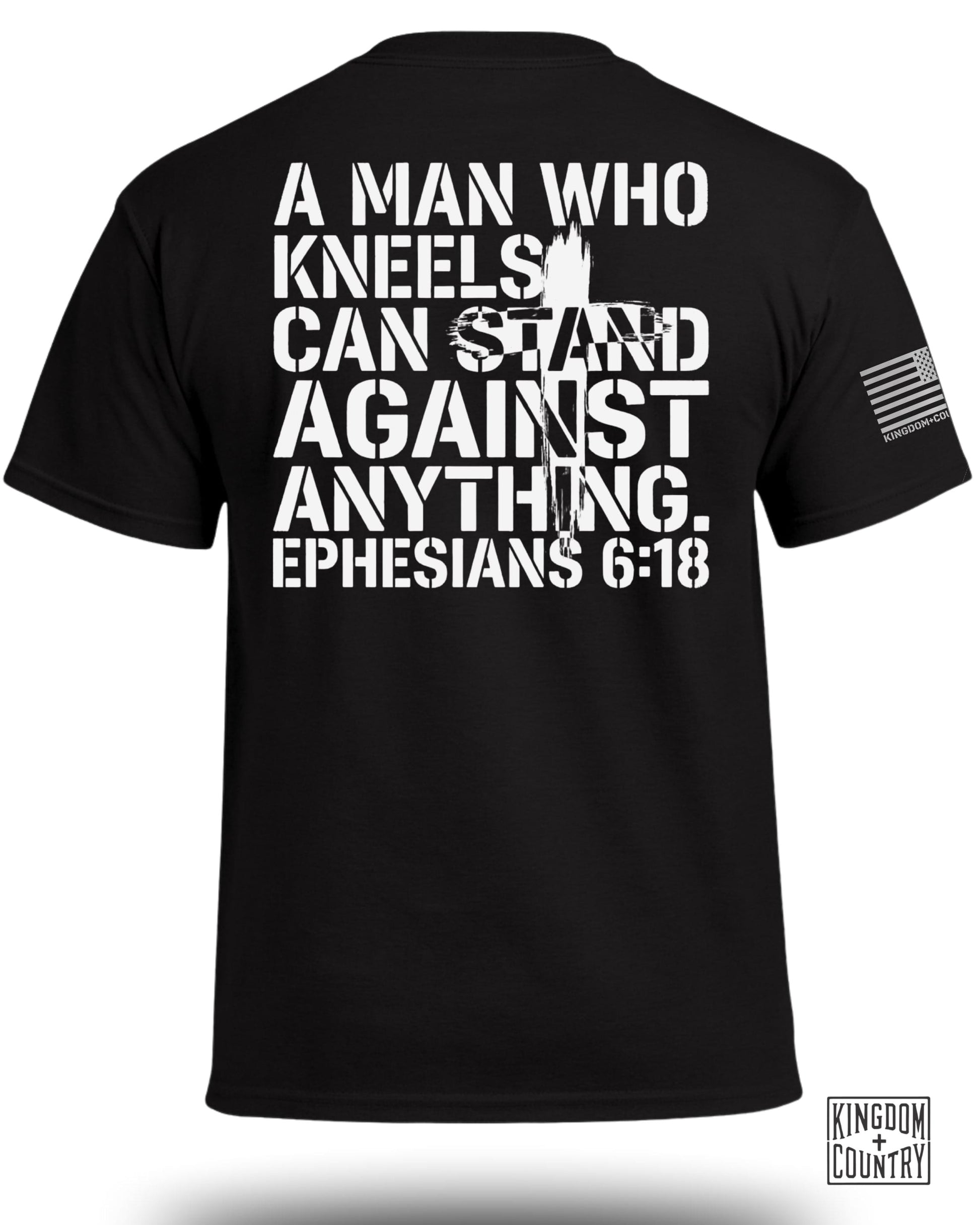 Black t-shirt with white text "A MAN WHO KNEELS CAN STAND AGAINST ANYTHING. EPHESIANS 6:18."