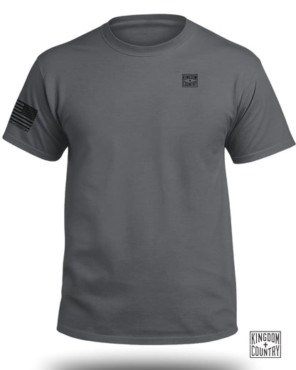 Gray t-shirt with "Kingdom + Country" logo on chest and American flag on sleeve.