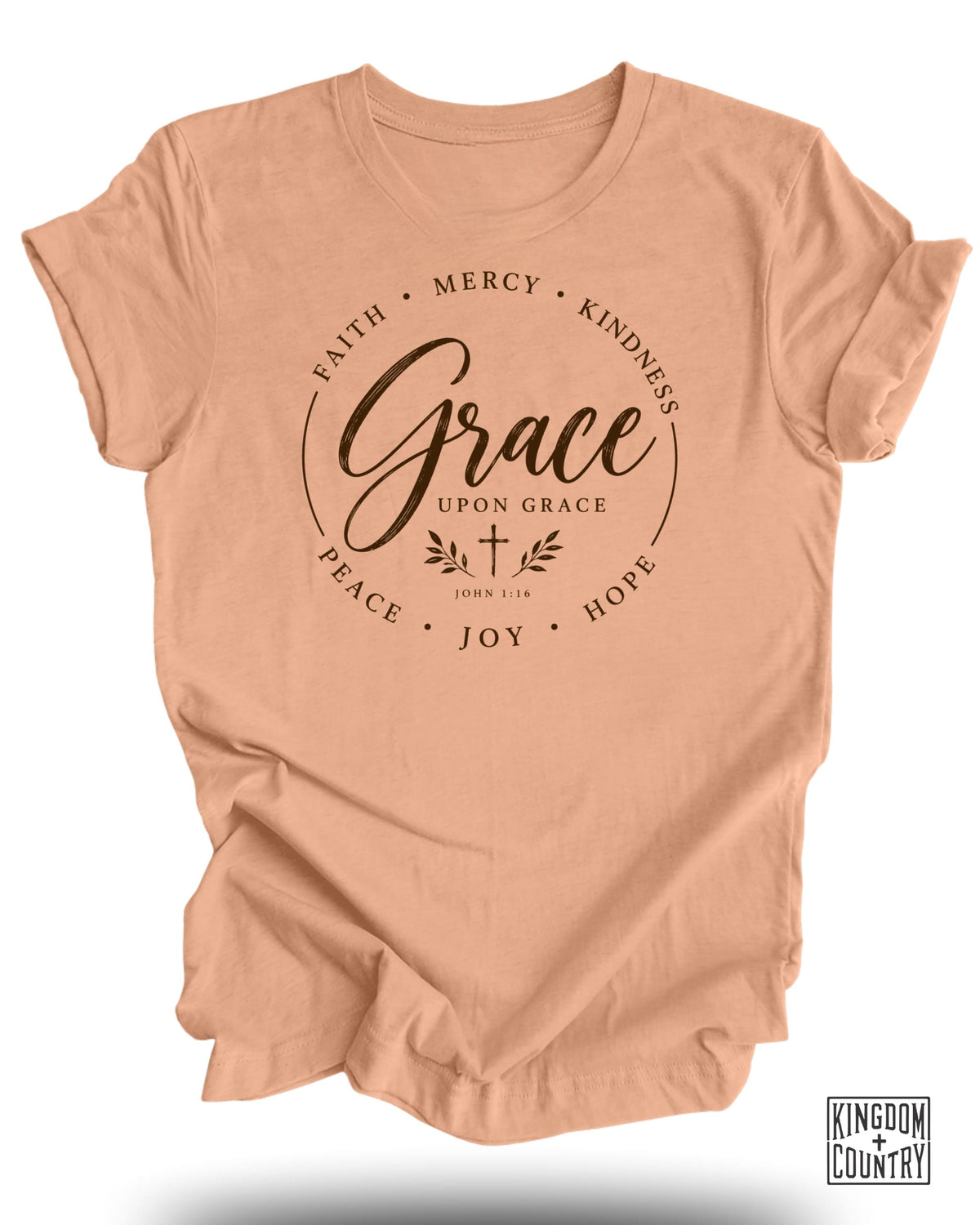 Peach t-shirt with "Grace Upon Grace" text and surrounding words: faith, mercy, kindness, hope, joy, peace.