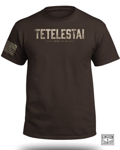 Brown t-shirt with "TETELSTAI JOHN 19:30" text and American flag sleeve detail.