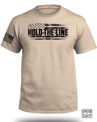 Tan t-shirt with distressed American flag graphic and text "HOLD THE LINE HEBREWS 10:23".