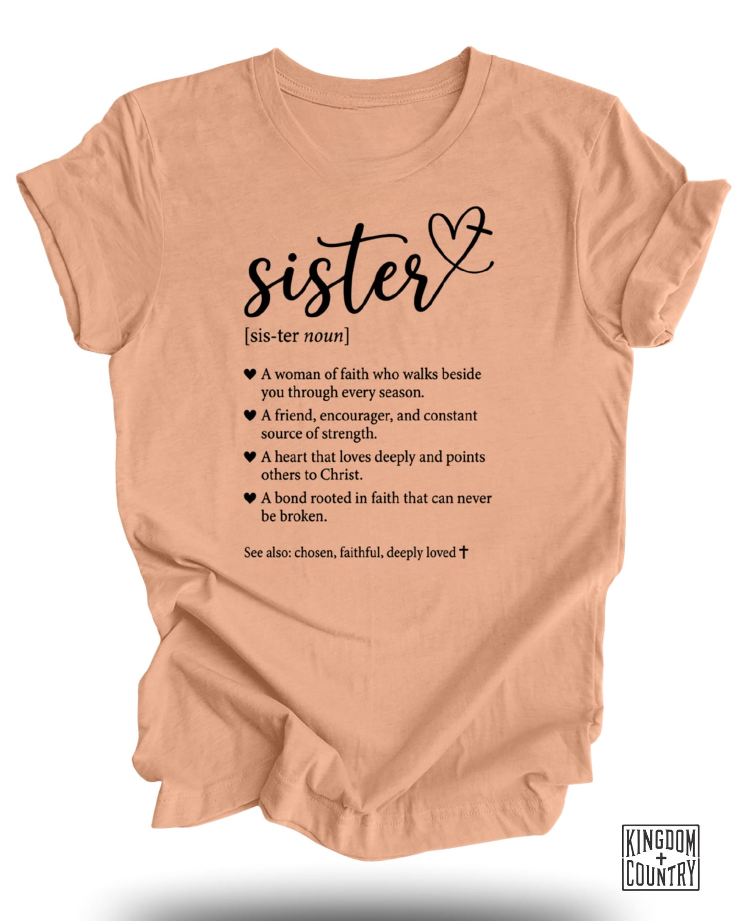 Peach t-shirt with "sister [sis-ter noun]" definition and Kingdom Country logo.