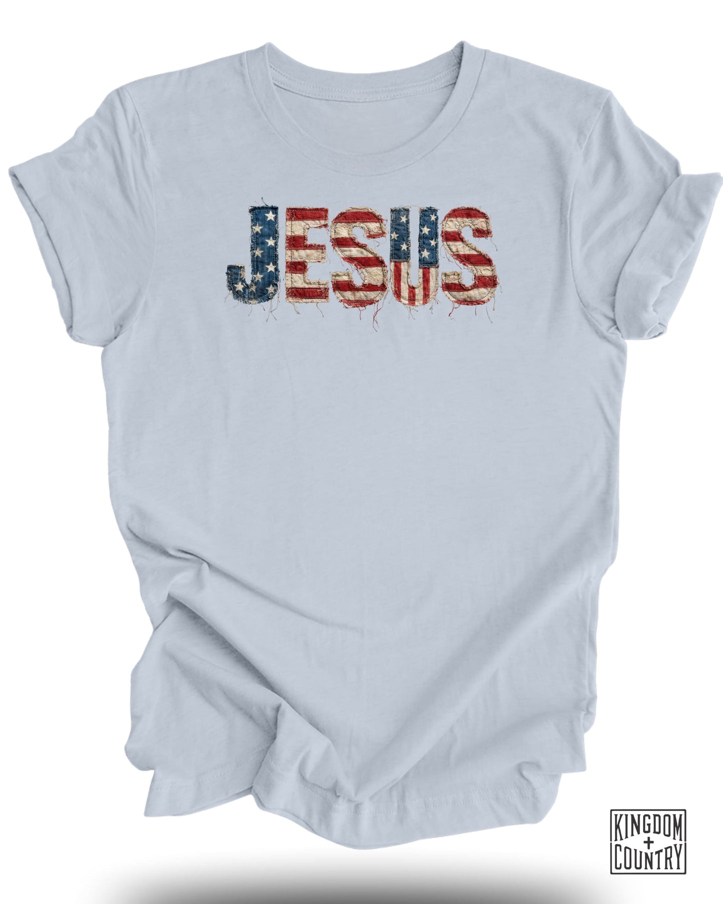 Light blue t-shirt with "JESUS" in distressed American flag design.