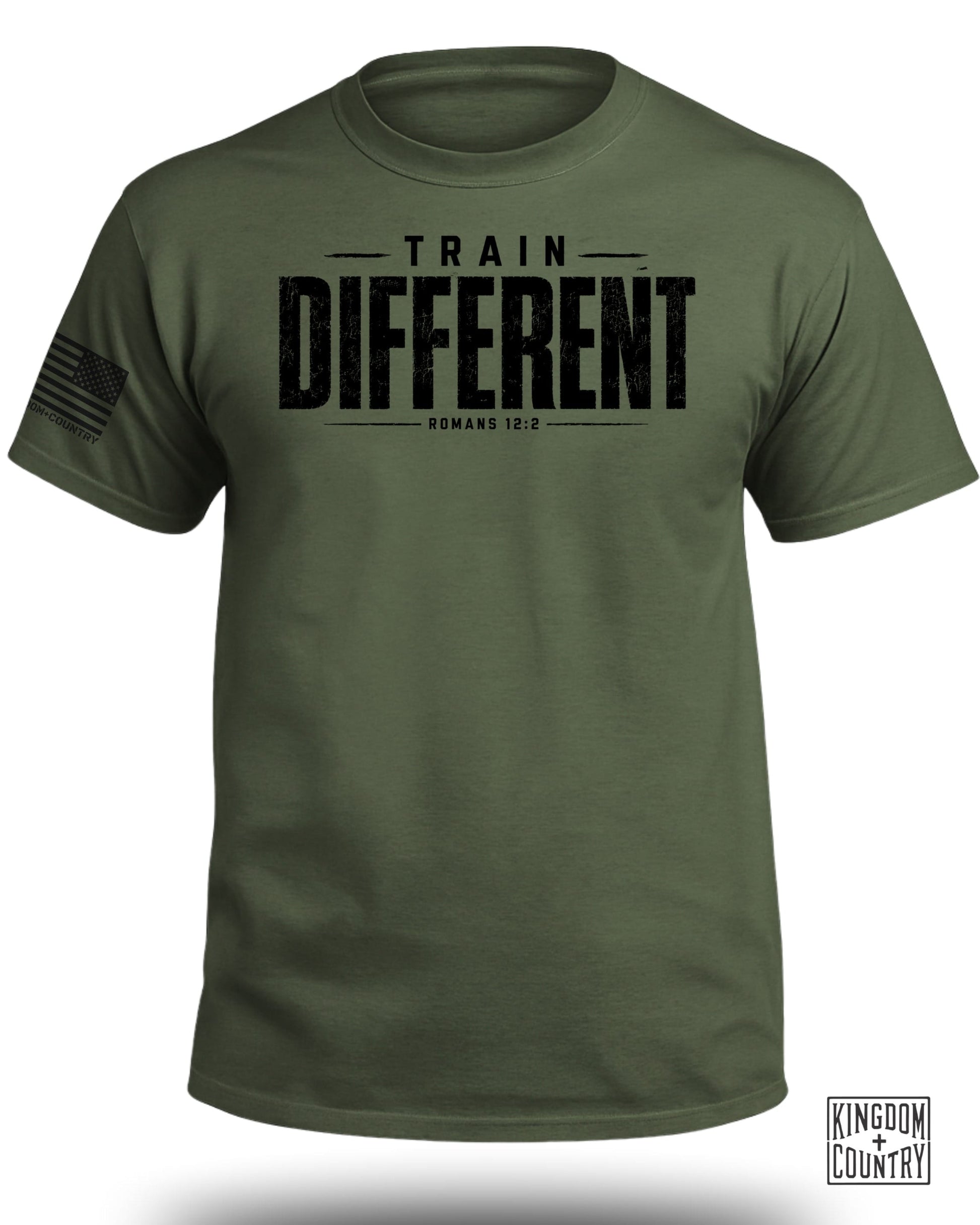 Green t-shirt with black text "TRAIN DIFFERENT ROMANS 12:2" and American flag sleeve patch.
