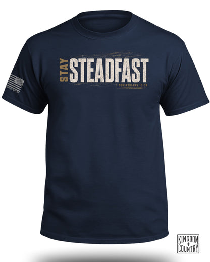 Navy t-shirt with "STAY STEADFAST" graphic and "1 Corinthians 15:58".