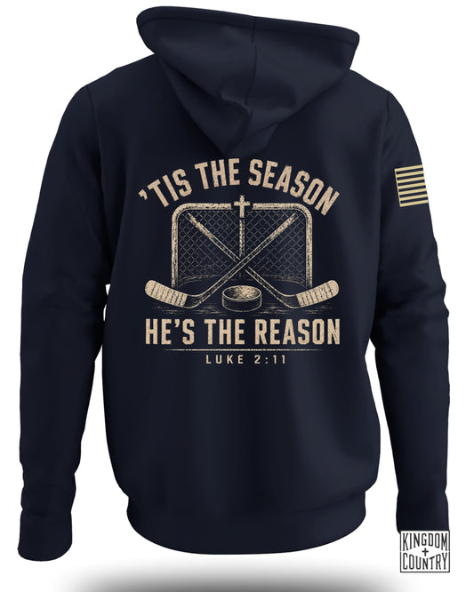 Back view of a dark blue hooded sweatshirt featuring a hockey graphic with Christian text.