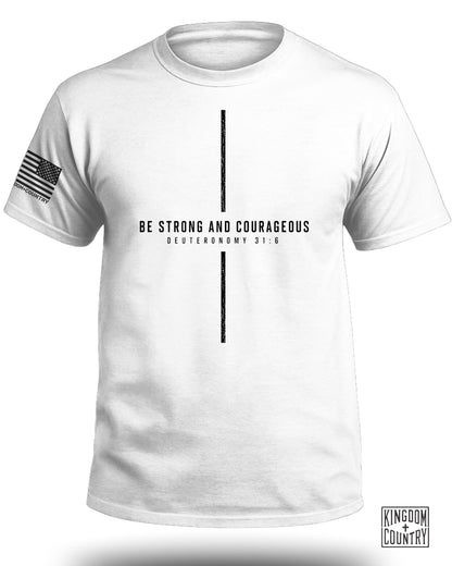 White t-shirt with distressed cross graphic and text "BE STRONG AND COURAGEOUS DEUTERONOMY 31:6".