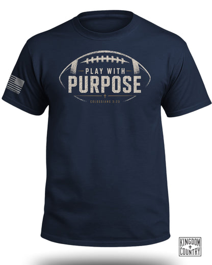 Navy t-shirt with football graphic, "PLAY WITH PURPOSE," and "COLOSSIANS 3:23."