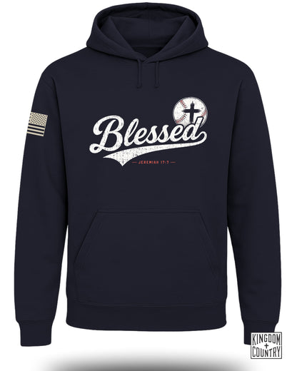 Navy blue hooded sweatshirt featuring the word Blessed, a baseball with a cross, and an American flag patch on the sleeve.