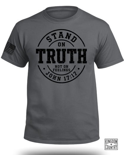 Gray t-shirt with text "Stand on Truth Not on Feelings John 17:17" and US flag.