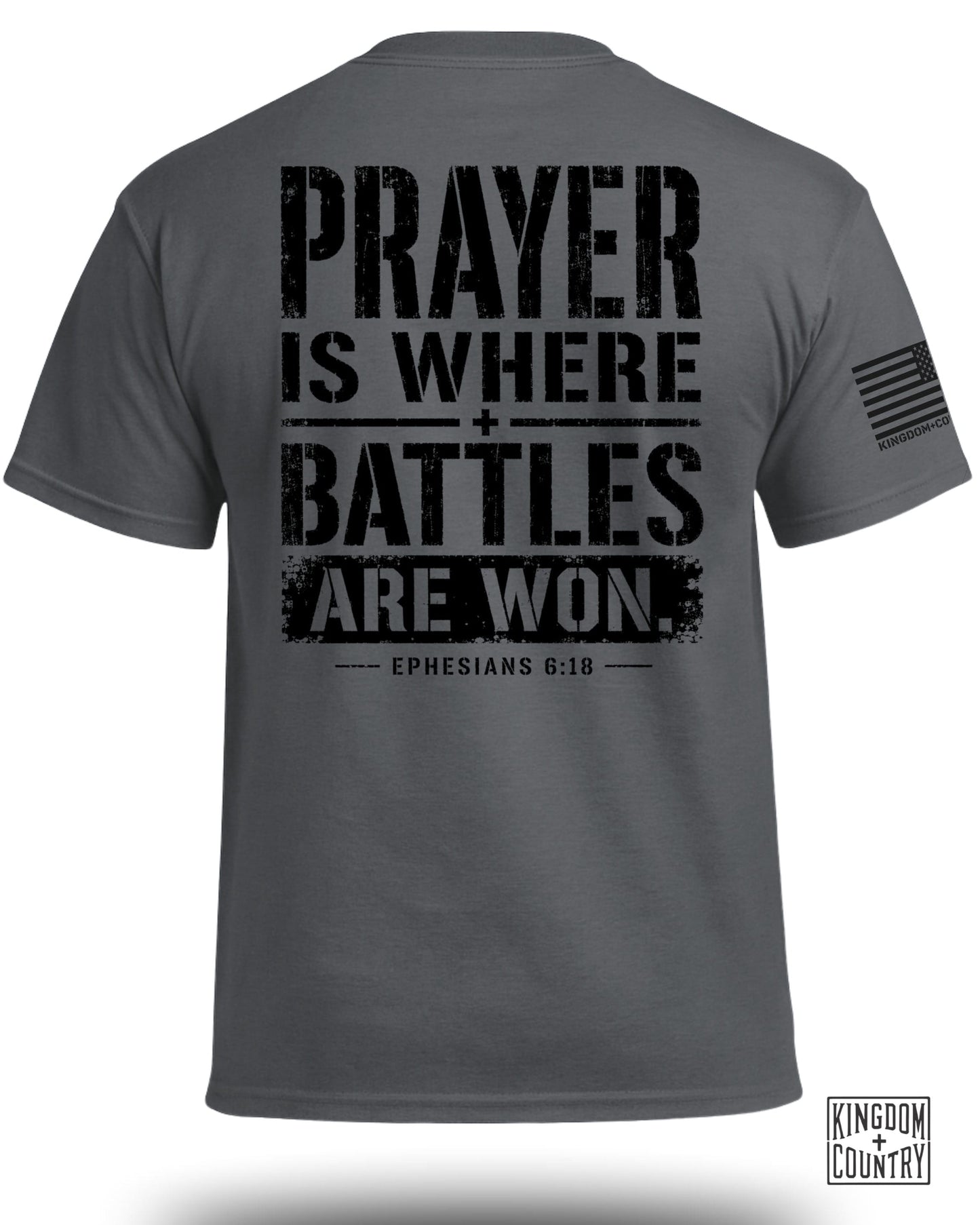 Dark grey t-shirt with black text: "PRAYER IS WHERE BATTLES ARE WON. EPHESIANS 6:18".