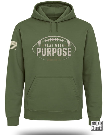 Green hoodie with football graphic and text "PLAY WITH PURPOSE" and "COLOSSIANS 3:23".