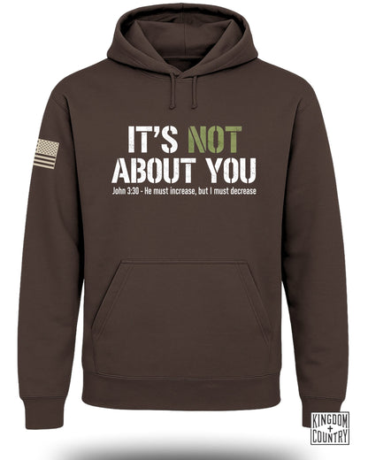 Brown hoodie with "It's Not About You" text and American flag patch.
