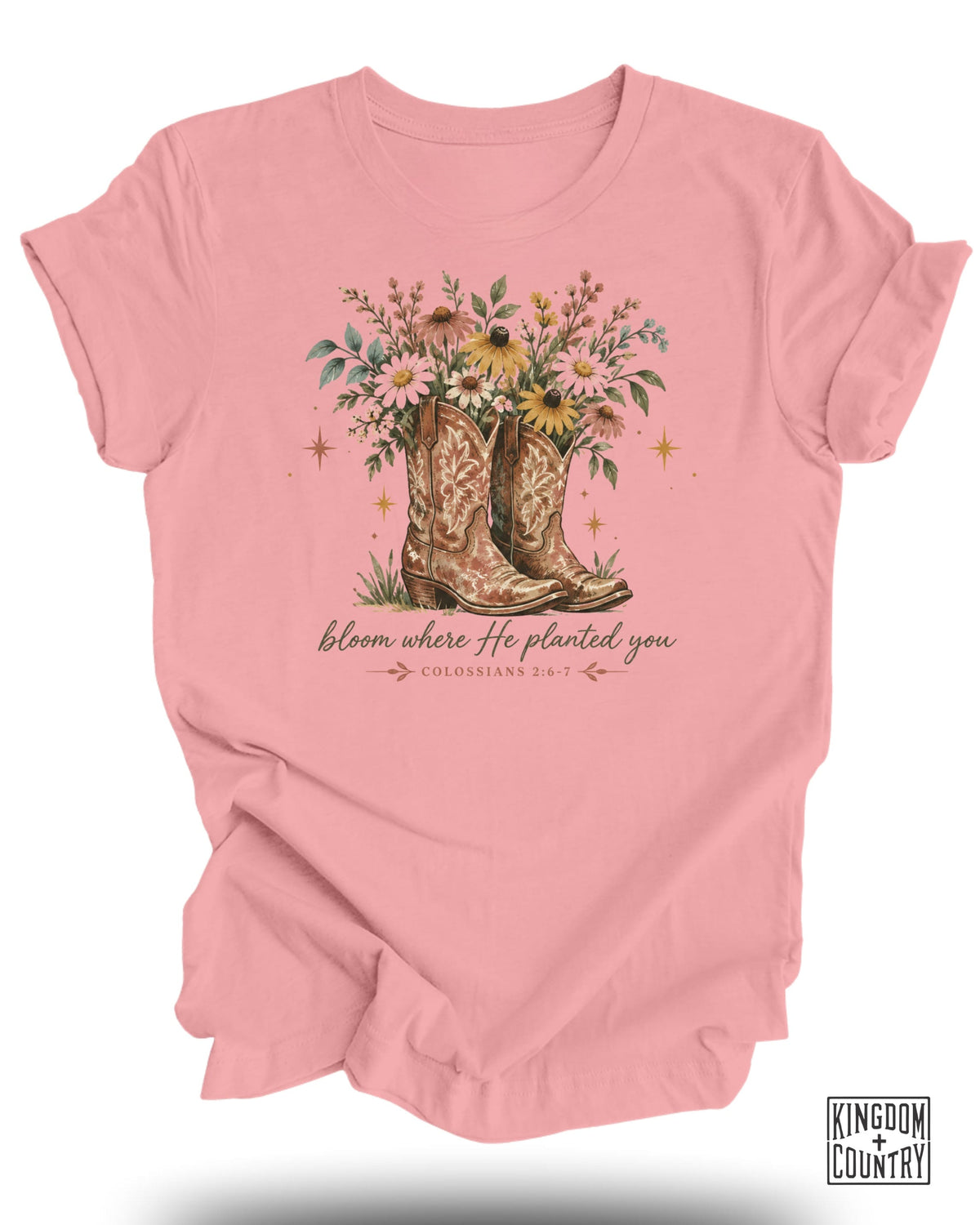 Pink t-shirt with cowboy boots filled with flowers and text "bloom where He planted you".