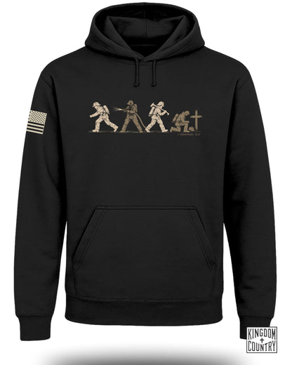 Black hooded sweatshirt with a firefighter graphic on the chest and an American flag patch on the sleeve.