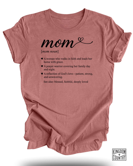 "Mom" definition shirt with faith-based attributes.