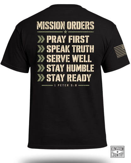 Black t-shirt with "MISSION ORDERS" and list: Pray First, Speak Truth, Serve Well, Stay Humble, Stay Ready.