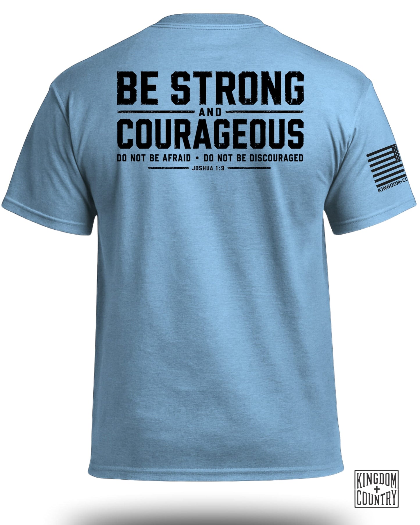 Light blue t-shirt with "Be Strong and Courageous" text and American flag sleeve graphic.