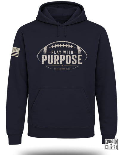 Navy hoodie with football graphic, "PLAY WITH PURPOSE" text, and American flag patch.