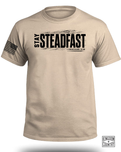 T-shirt with black "STAY STEADFAST" text and 1 Corinthians 15:58.