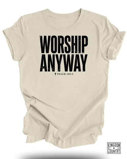 Cream t-shirt with black text "WORSHIP ANYWAY" and "PSALM 100:2".