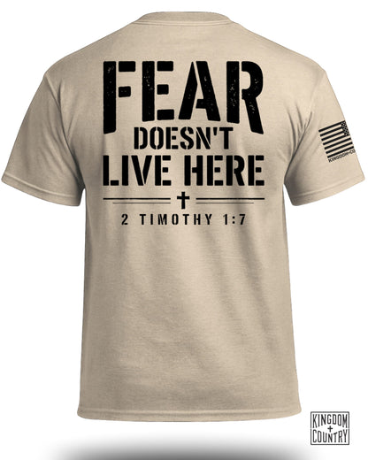 Tan t-shirt with "FEAR DOESN'T LIVE HERE" and 2 Timothy 1:7.