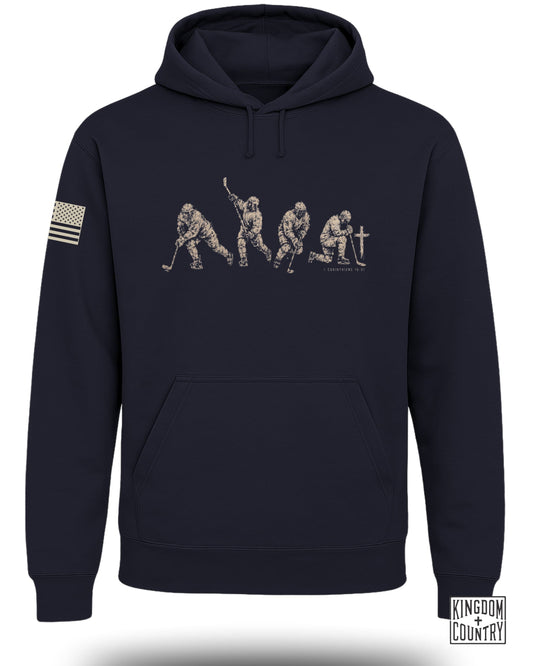 Navy hoodie with vintage hockey player graphic and 1 Corinthians 10:31.