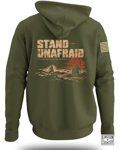 Olive green hoodie with "STAND UNAFRAID THE BATTLE IS THE LORD'S 1 SAMUEL 17:47" graphic.