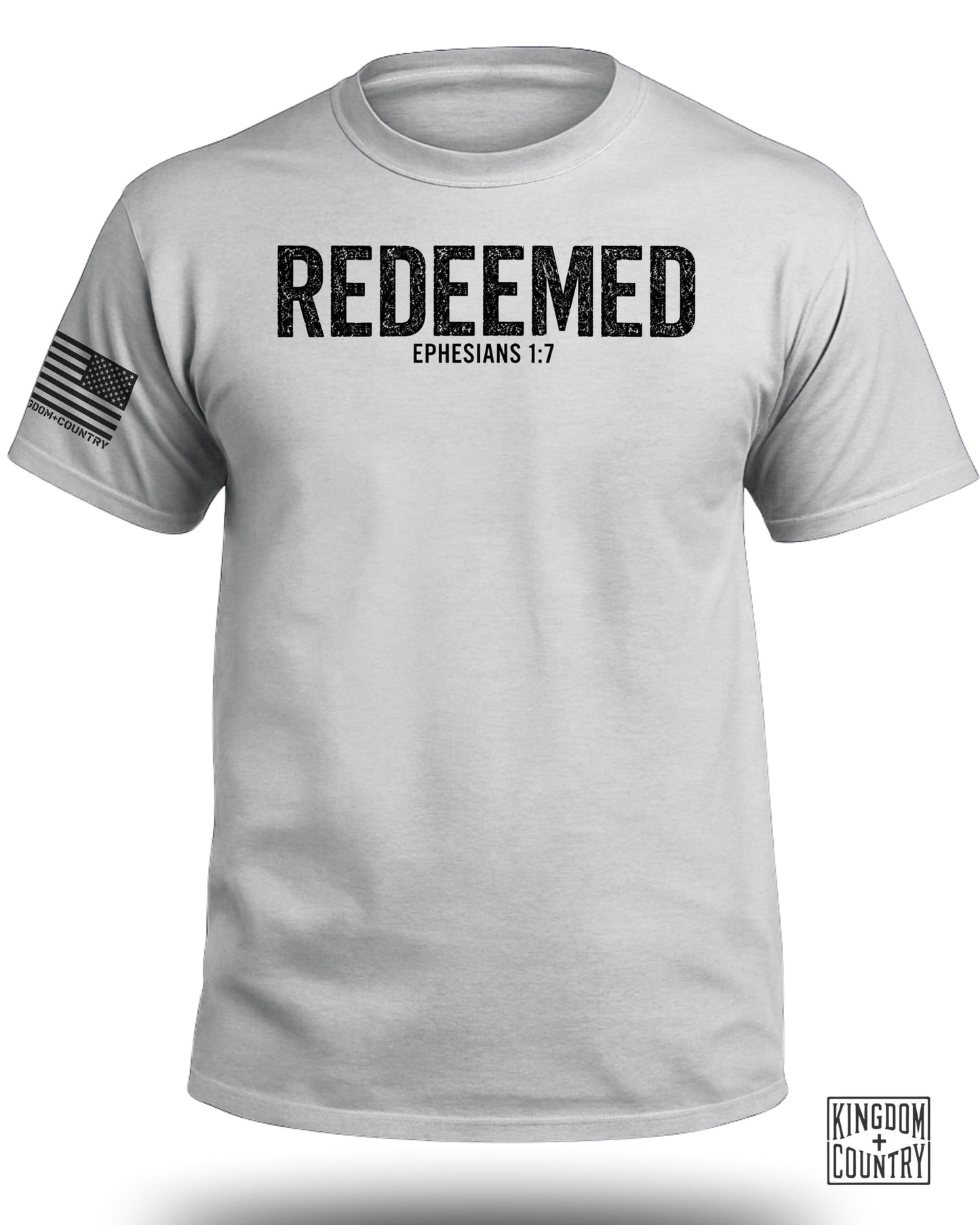 White t-shirt with "REDEEMED EPHESIANS 1:7" text and an American flag detail.
