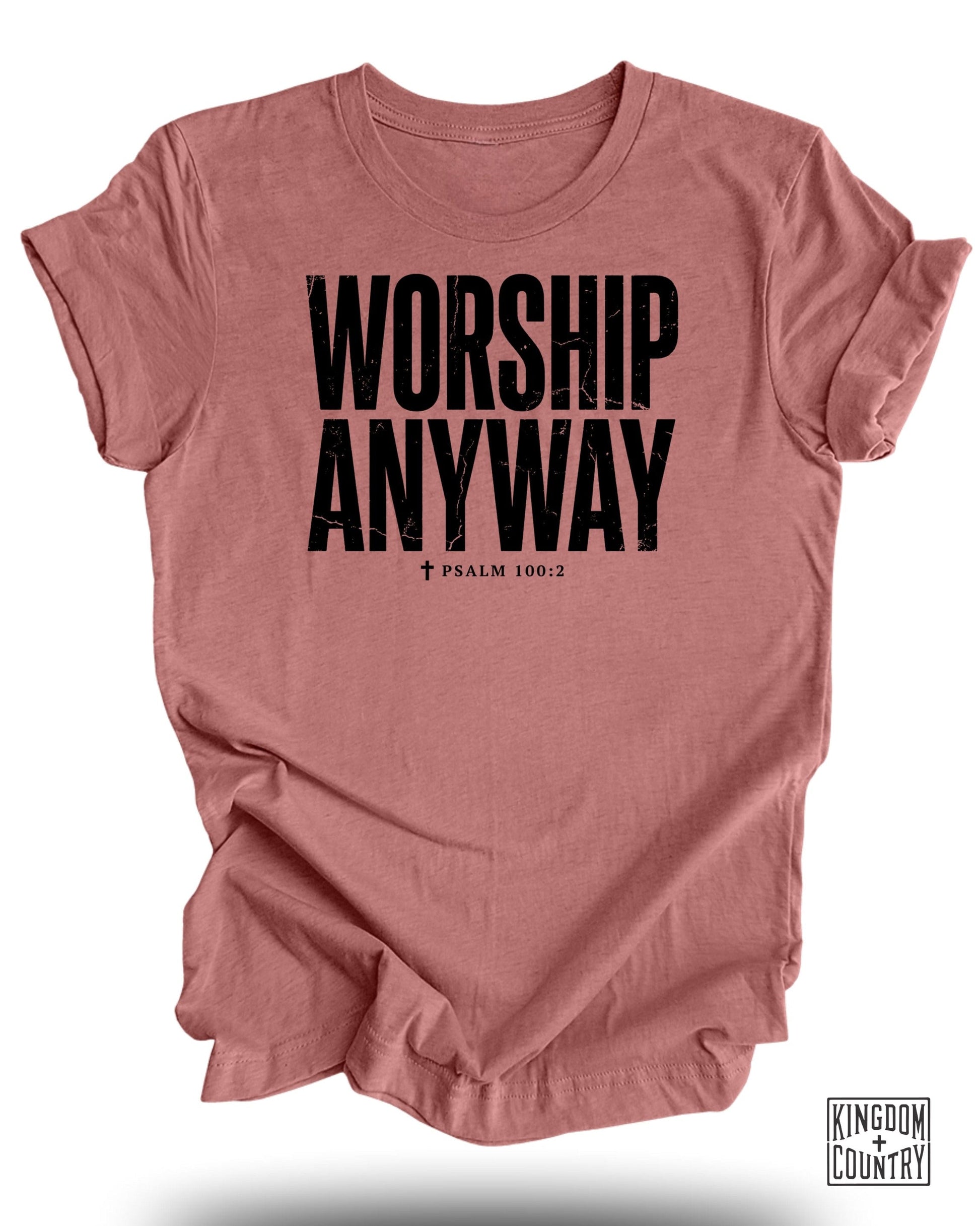Pink t-shirt with black text "WORSHIP ANYWAY † PSALM 100:2".