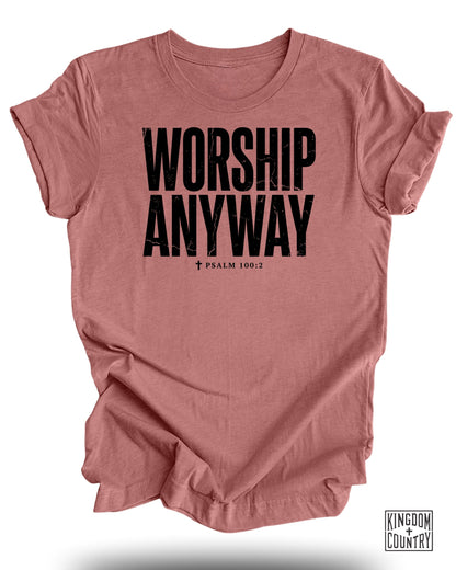 Pink t-shirt with black text "WORSHIP ANYWAY † PSALM 100:2".