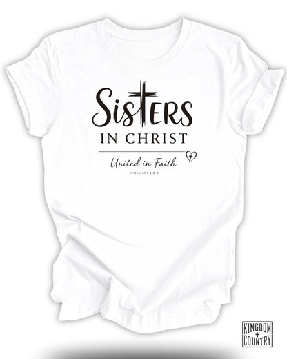 White t-shirt with "Sisters in Christ United in Faith" text and Ephesians 4:2-3.
